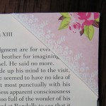 pink corner bookmark on a page